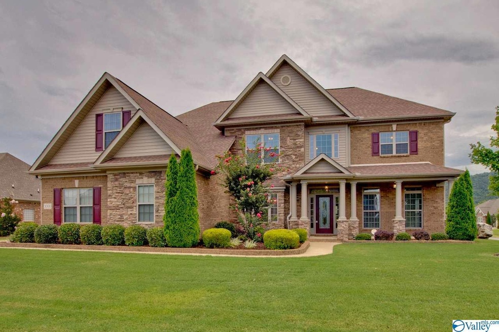 This sensational 5 bedroom, 4.5 bath family home is loaded with extras in the highly-desirable McMullen Cove subdivision.