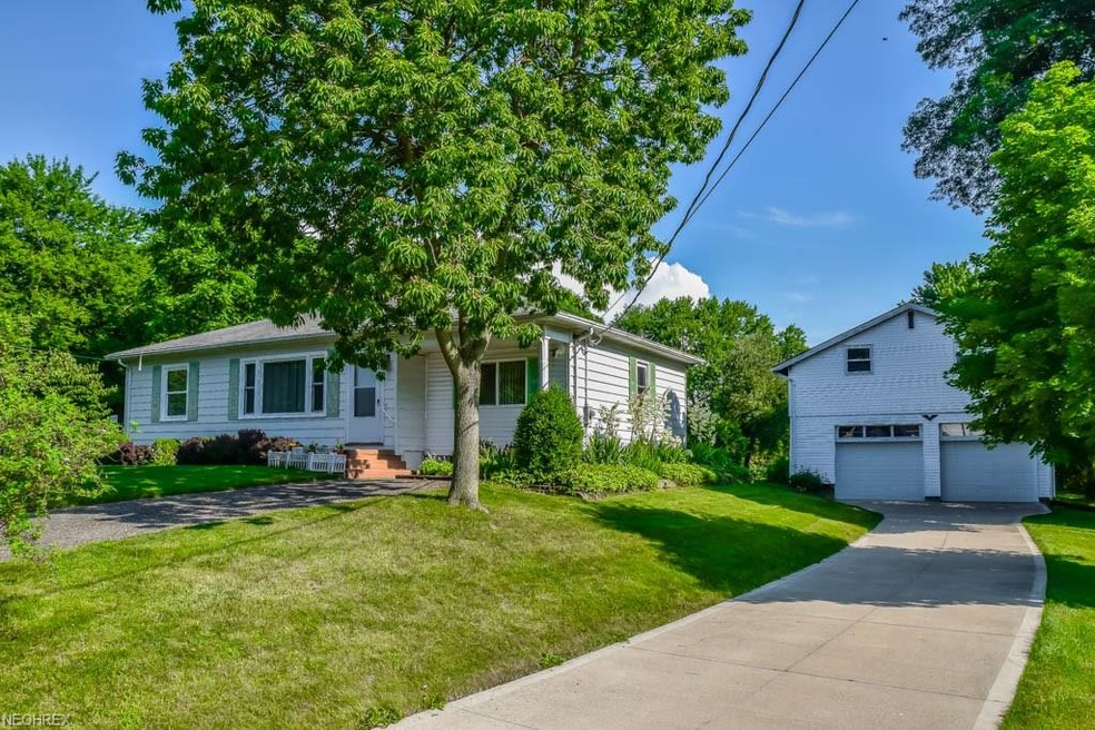 Well maintained 2 bedroom, 1.5 bath ranch with 2 large outbuildings on 1.1 acres in North Canton!