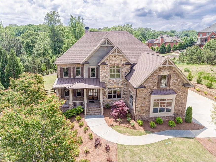 Gorgeous faade boasting 4 side brick and natural s