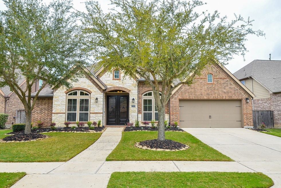 Welcome to 27822 Arbury Crest CT. Stone and brick