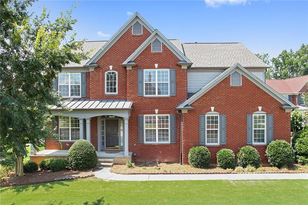 Entrance showing rocking chair front porch