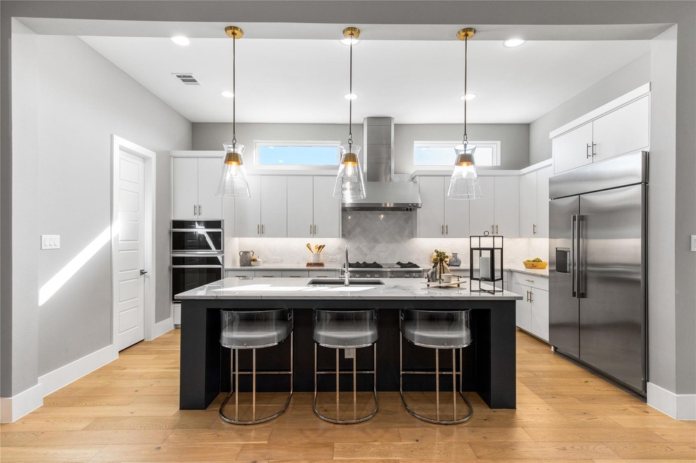 Kitchen featuring top of the line appliances and s