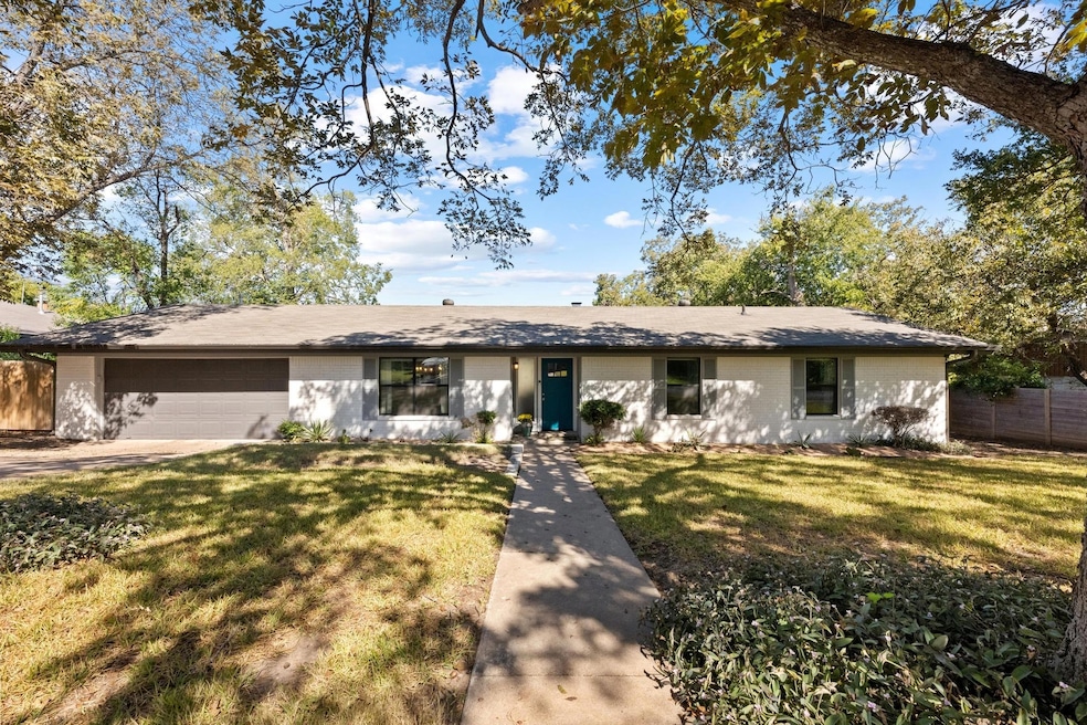 Single story home with an attached garage