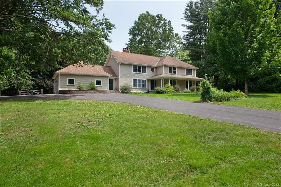 SET BACK AND GRACIOUS THIS ONE OF A KIND HOME IS P
