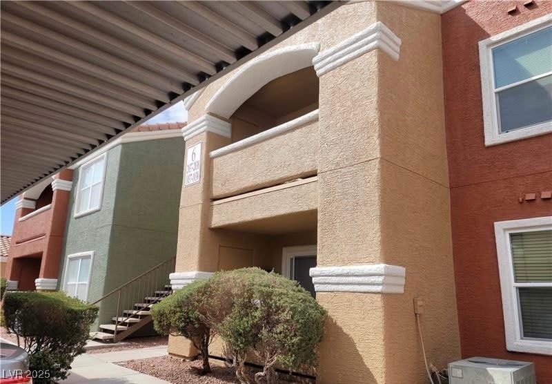 View of property with stairway