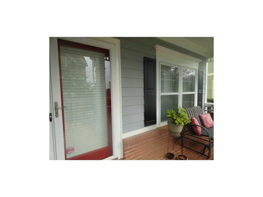 Exterior Front. House faces west rocking chair fro
