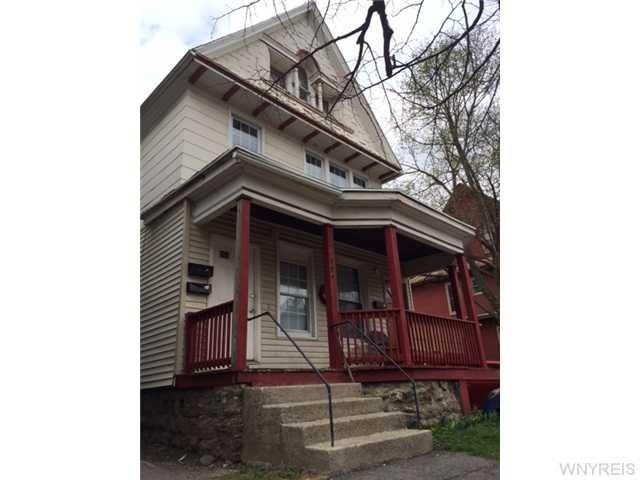 Exterior Front vinyl sided and a nice porch