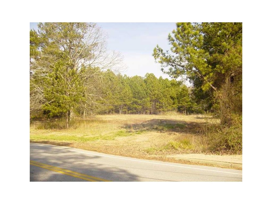 Exterior Front. View into property at Southern end