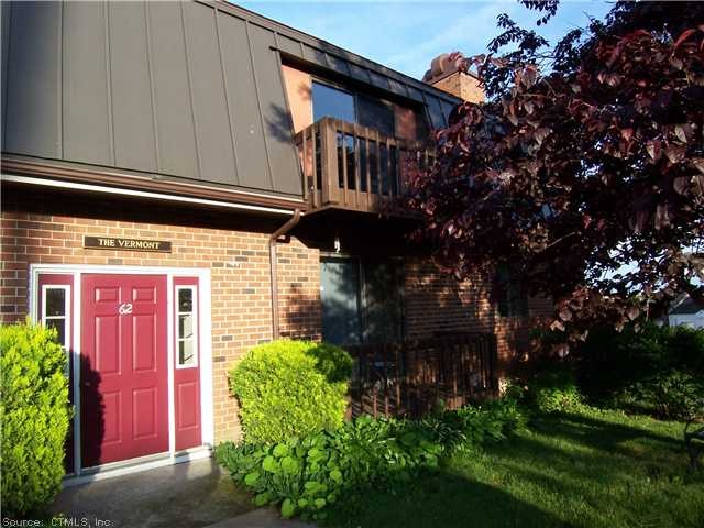 Exterior Front. Second floor end unit.