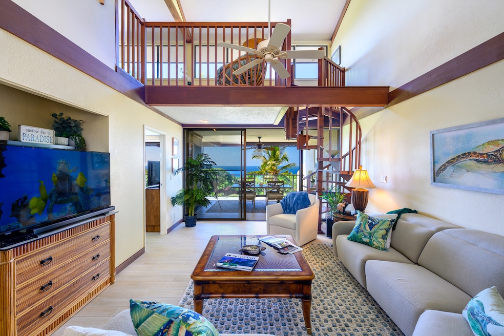 The living areas are updated with tile floors, wood trim, and an alcove that holds a big screen TV, for those times that you get tired of watching the views outdoors.