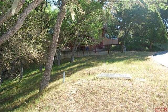 Post on left is corner of lot and extends close to
