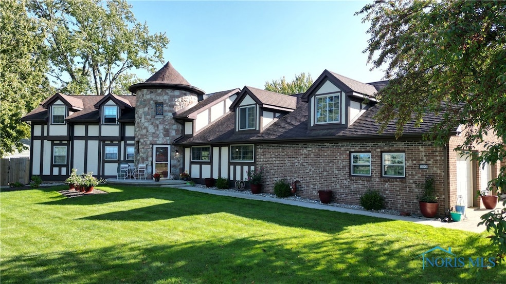 Dramatic two story stone foyer with sturdy strong
