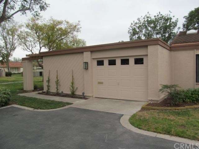 Driveway looking into garage door