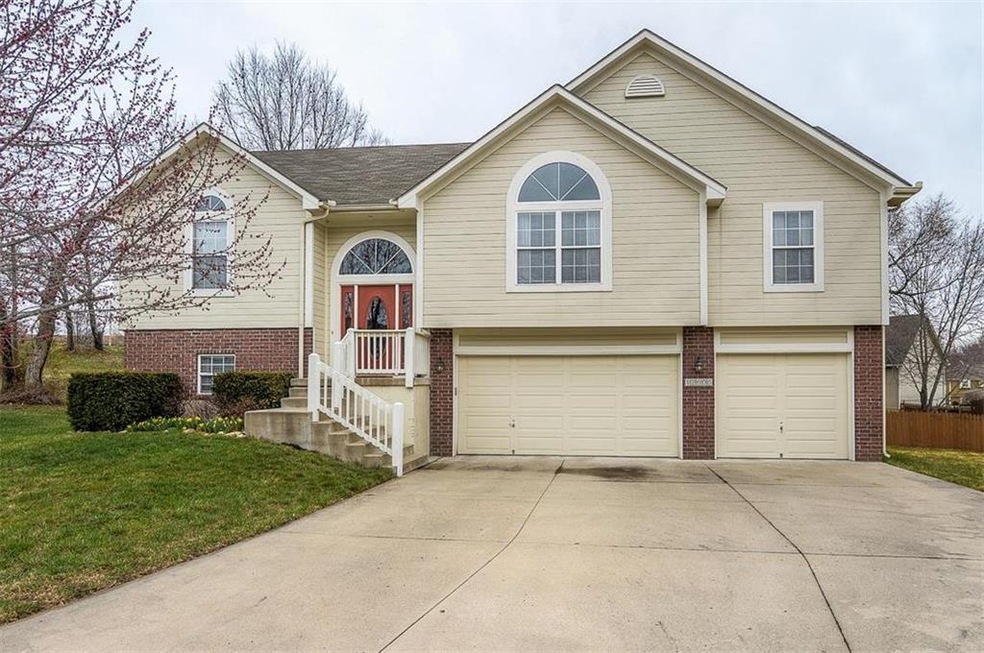 Front of Home with Large Flat Driveway.