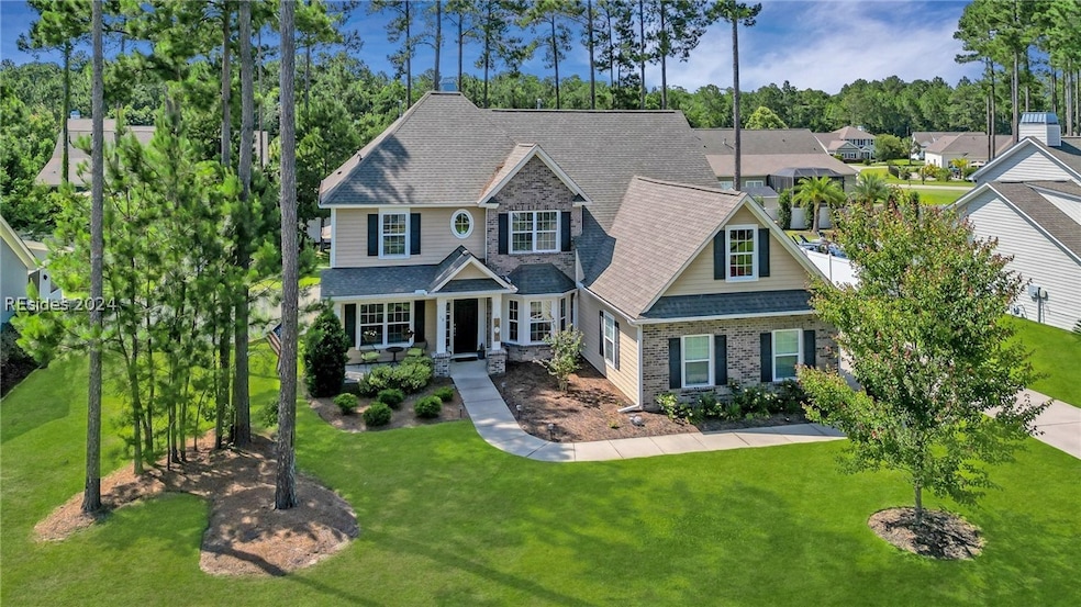 Craftsman-style house featuring a front yard