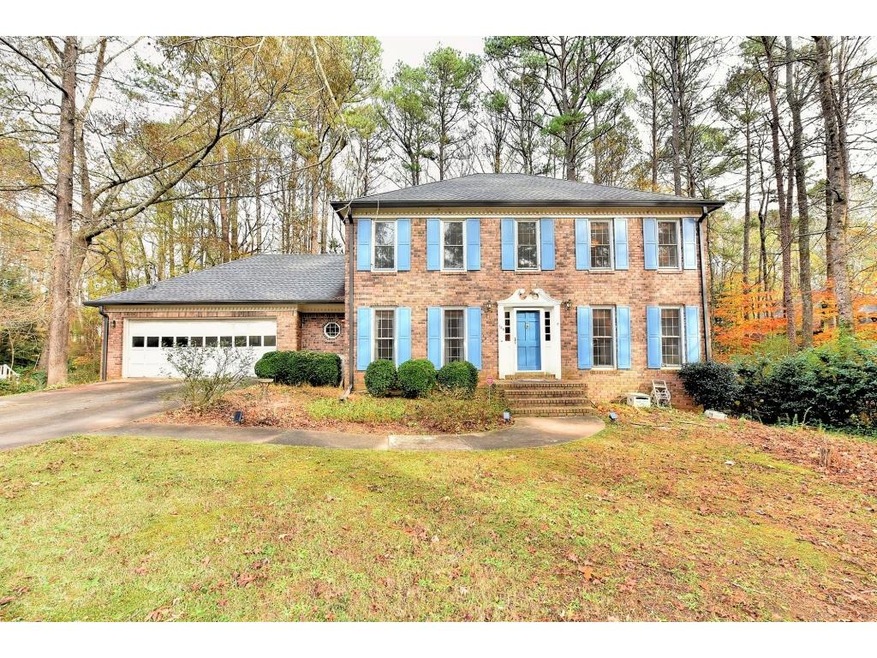 Three Sides Brick Home On Almost An Acre Lot