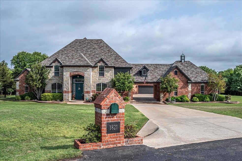 View of front of property with a front lawn