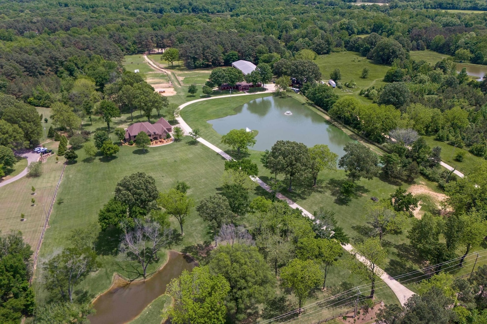Aerial view of property's location with a large bo