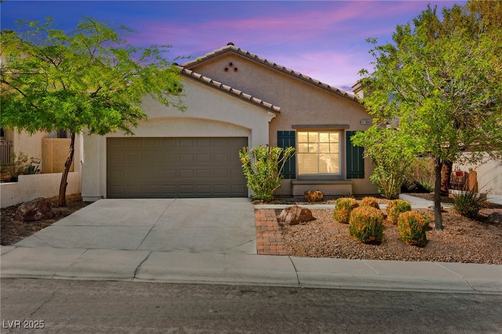 Mediterranean / spanish home with driveway, a gara