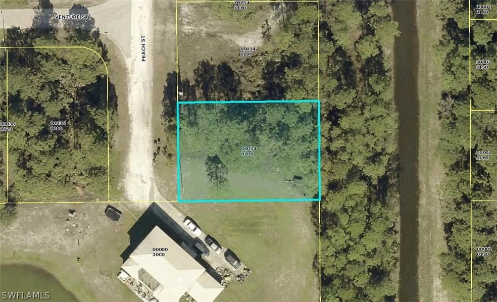 1075 Peach St, Lehigh Acres, FL 33974 - photo 1
