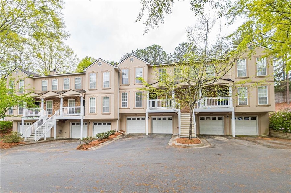 Townhome / multi-family property with a garage