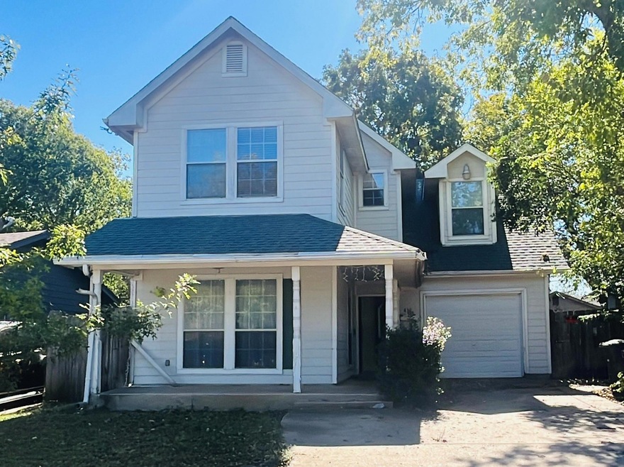 View of front property with a garage