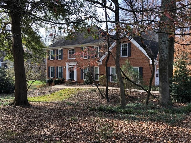 3 sided brick with hardy plank on rear located on 