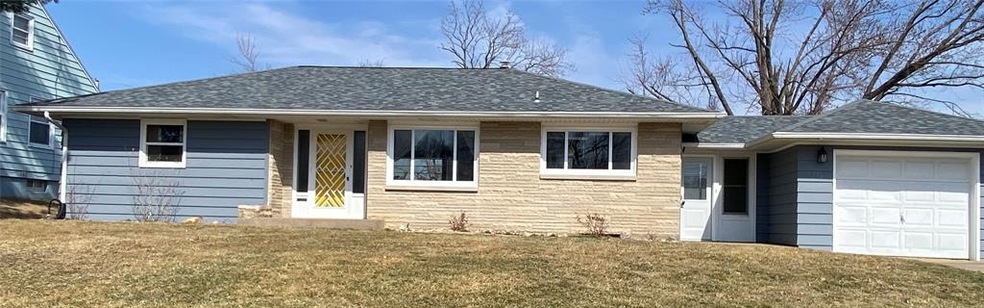 Front, new roof, large front and back yard.