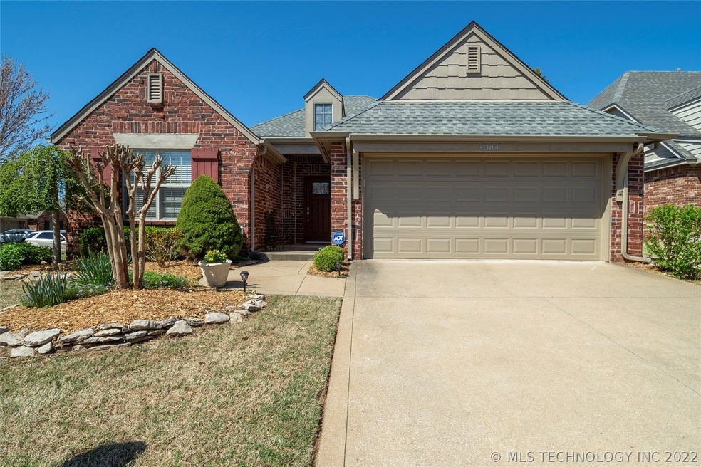 Charming 1-story full brick cottage in quiet gated