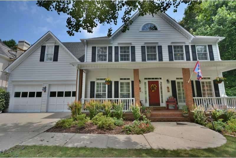 Exterior Front. Pristine home in active Hadfield Swim/Tennis community.