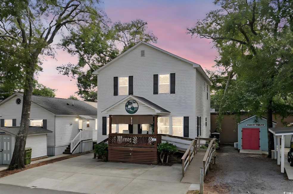Traditional-style house with a storage shed