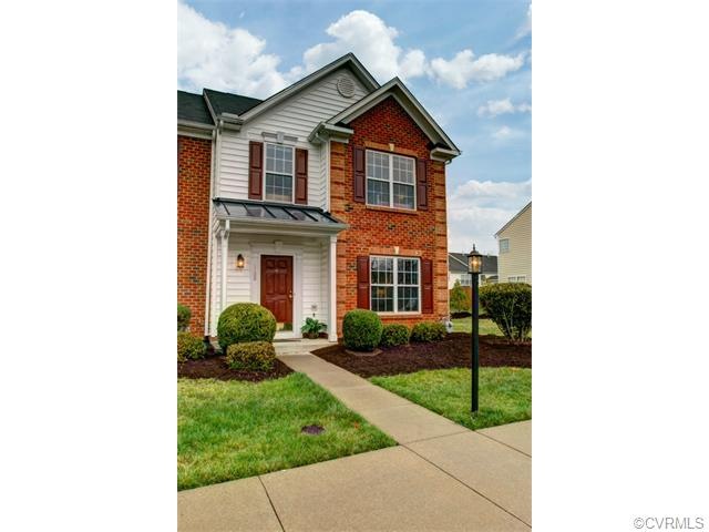 Lovely end unit home with covered front porch