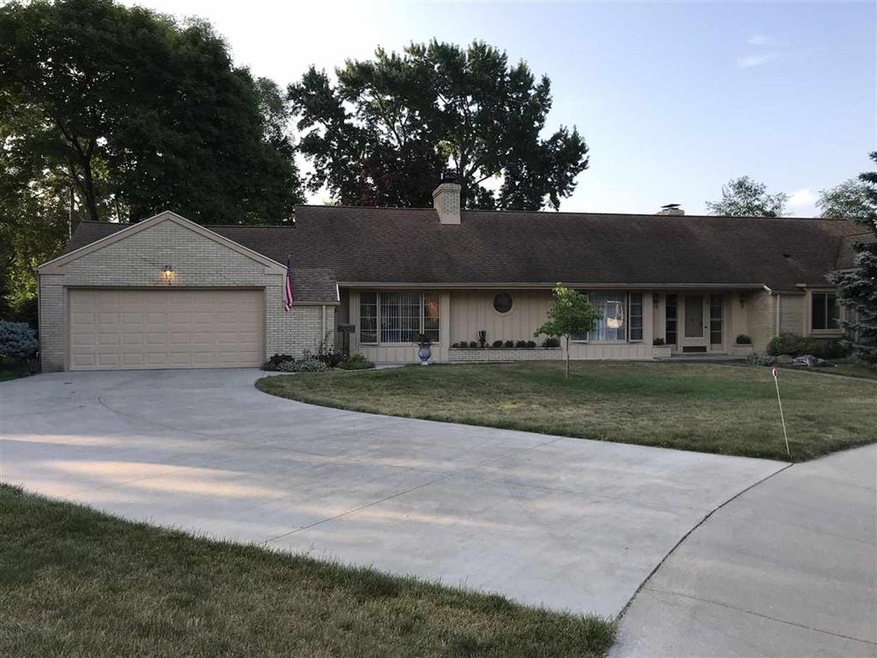 Setting on spacious, landscaped & private backyard