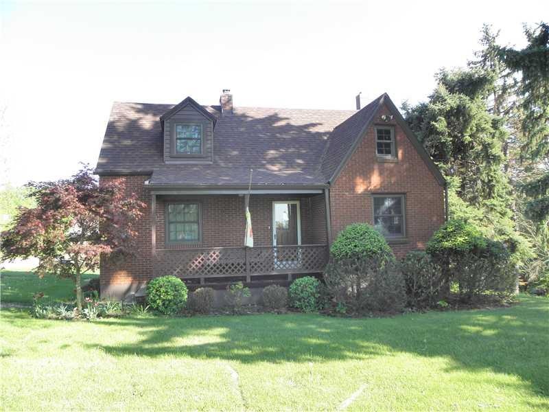 Exterior Front. Gorgeous Brick Cape Cod on 2.1958 