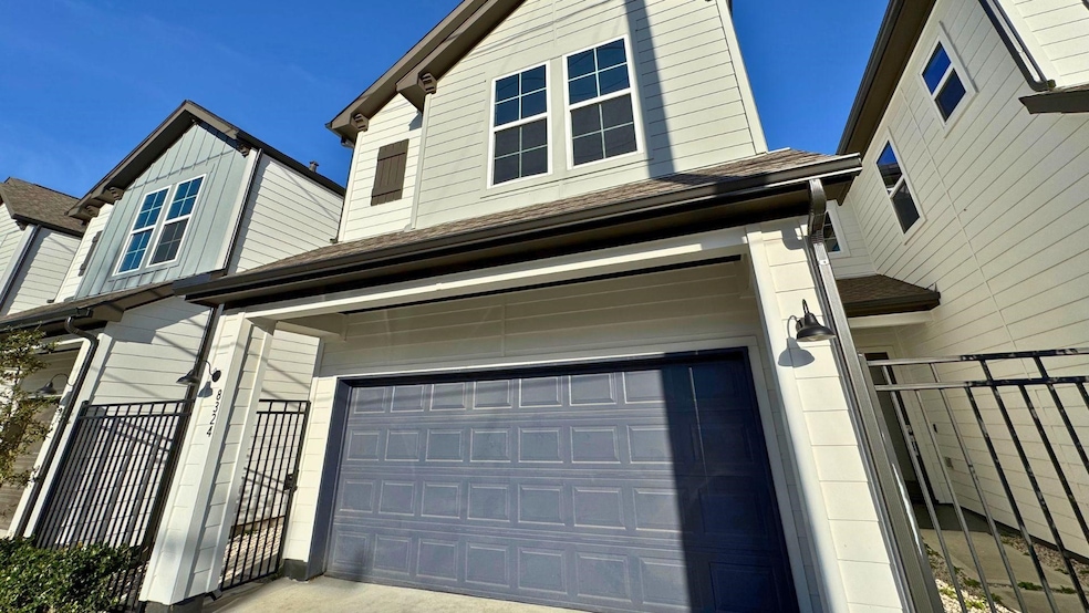 Large 2 car garage just inside this gated communit