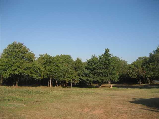 Exterior Front. 2.51 acres open and wooded land. L