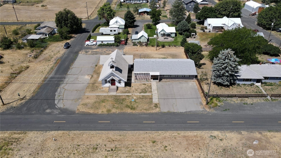 Charming church and community hall on large corner lot!