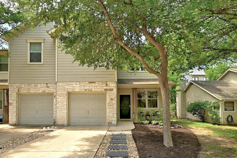 View of front of property featuring concrete driv