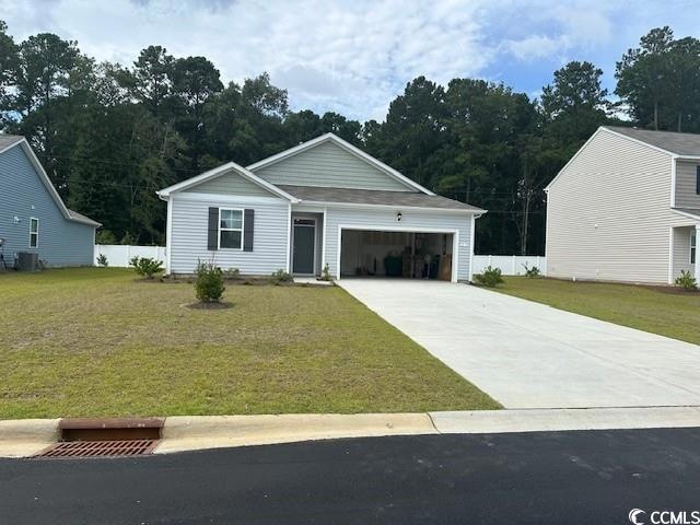 View of front of property featuring a front yard a