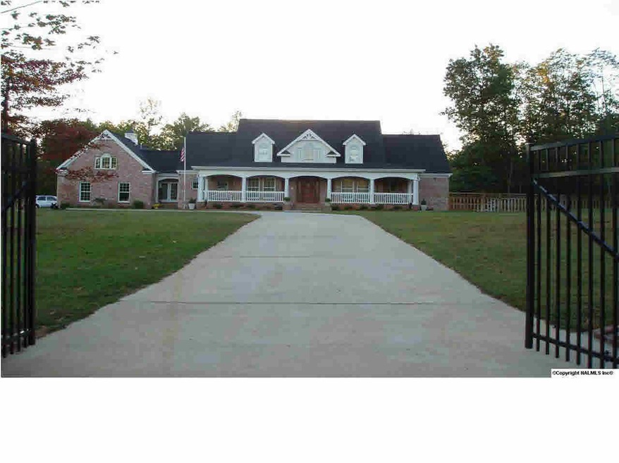 This custom home is perfectly nestled on 5 beautiful acres atop Green Mountain.