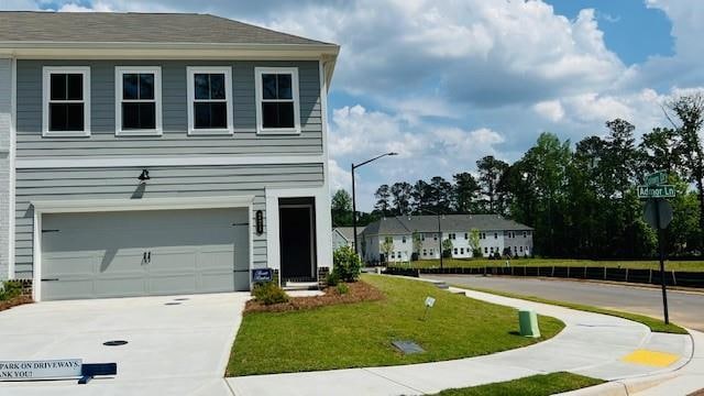 View of front of home featuring an attached garage