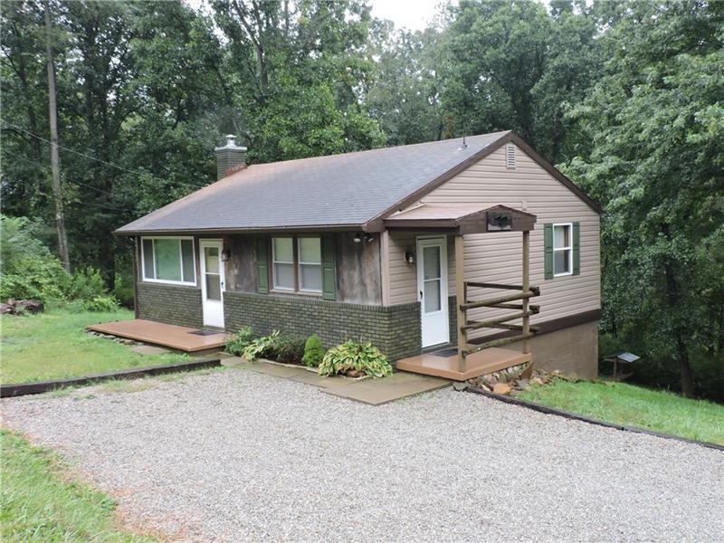 This Super Cute Home Sits on Over an Acre and is M