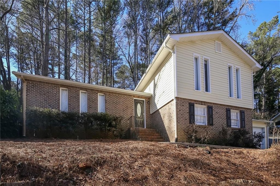 View of front of home with brick siding