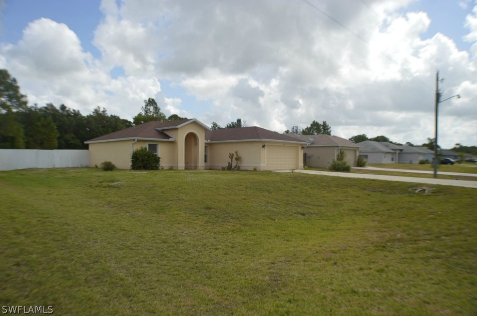 122 Ridgemont Dr, Lehigh Acres, FL 33972 - photo 1