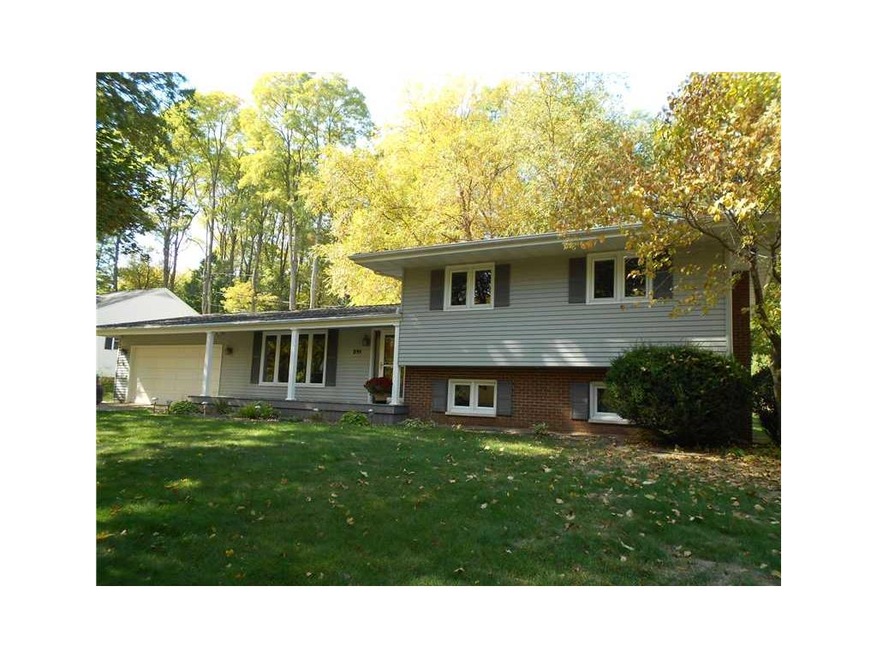 Front Exterior. Must see quad level home with long