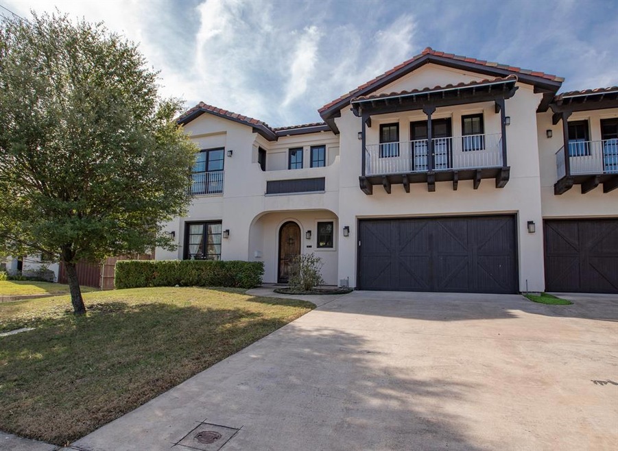 Awesome curb appeal for this cool Mediterranean to