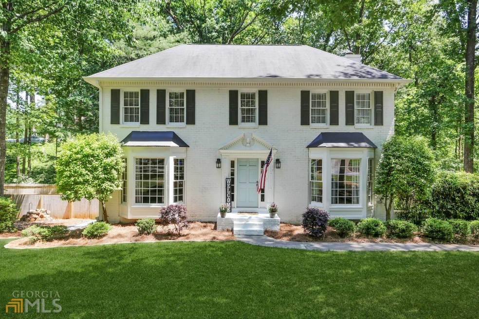 Classic White Painted Brick Front Colonial