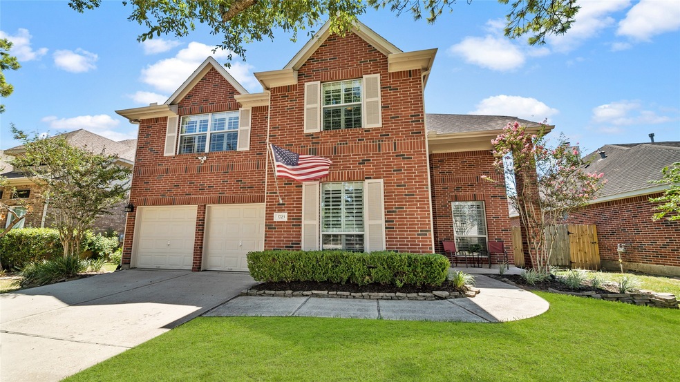 Beautiful curb appeal on this stately home with no back neighbors!