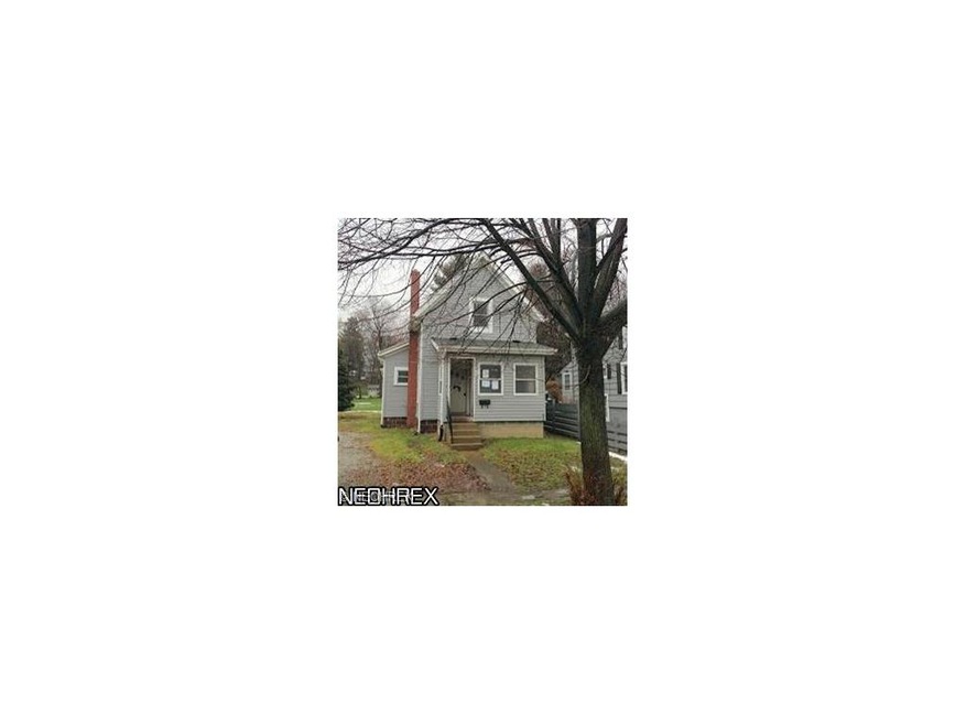 Front features an enclosed porch that could be use