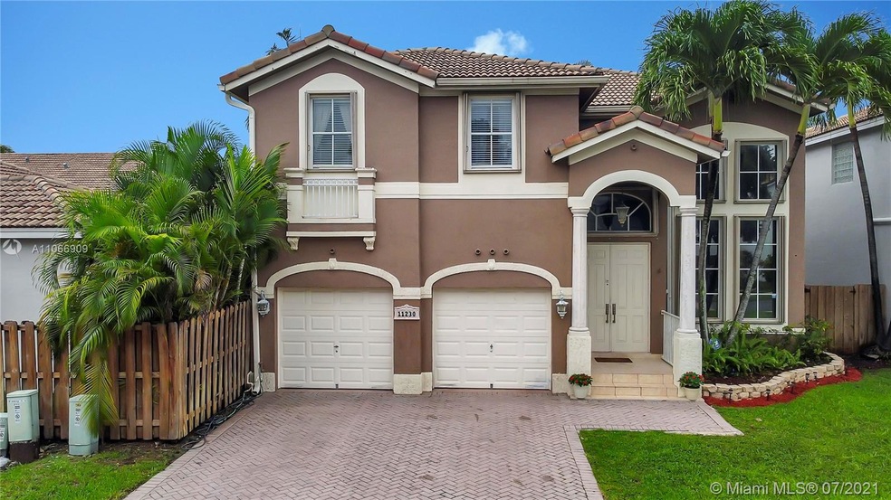 11230 NW 48th Terrace, Doral, FL 33178 - photo 1